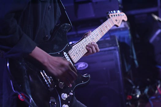 musician playing guitar