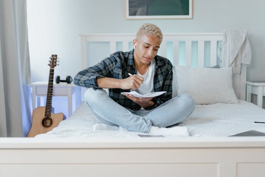 student studying with music