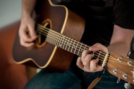 musician playing guitar